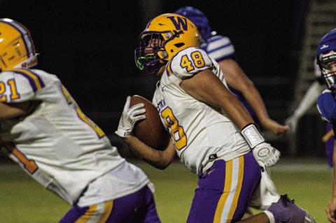Weleetka Outlaws Dominate Cyril with 50-0 Victory
