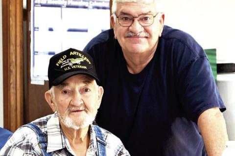 The Dustin Activities Commitee honored area veterans with a brunch on Thursday, November 6th at the Dustin City Hall. Pictured above are seated Raymond Summers and standing Jim Findley.