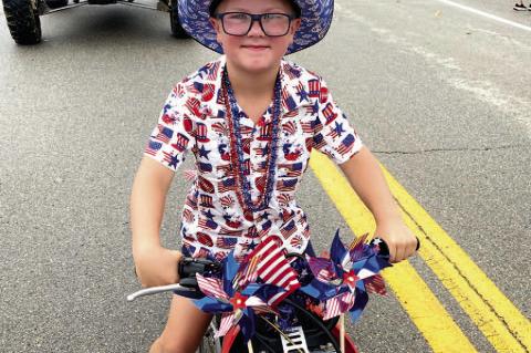 Kaxton Farned is a true patriot! He was all decked out in his red, white, and blue for the Calvin 4th of July parade.