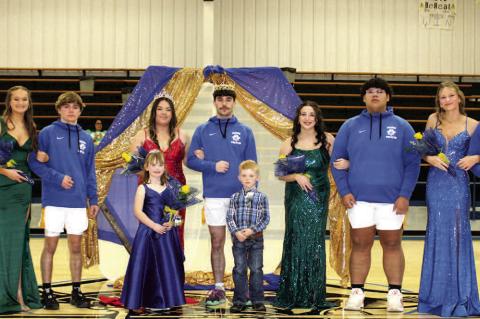 2025 MOSS HOMECOMING COURT. Front row: Regan Pitts (Kindergarten) and Waylon Gavin (Kindergarten). Back row: Paycee Van Haren (Sophomore), Tate Keesee (Sophomore), Gracelyn Wulf (Senior), Michael Simrell (Senior), Kara May- field (Junior), Tyler Harjochee