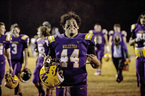 Joseph Kelough celebrates another victory in an unforgettable, undefeated season.