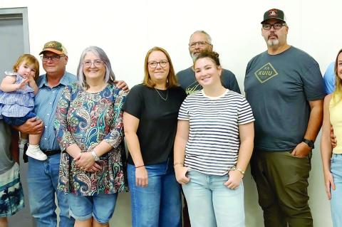 PETE DEAN FAMILY—(left to right) Jake Rutland, EmmaLynn Rutland, Randy and Paige Rutland, Erica, David (Tiger) and Jensen Dean, Britt Dean, Cade and Emma Dean.