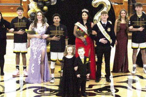 2025 CALVIN HOMECOMING COURT. Pictured above are (L-R): Sierra Ulmer, Jimmy Ayers, Caden White, Anderson Winningham, Jace Dickey, Queen Addison Woods, King Caleb Rocky, Kaden Howell, Braden Specht, Kayla Bain, and Wyatt Ulmer. Flower Girl Grace Peloquin, 