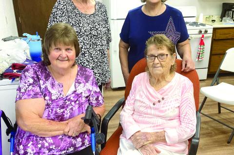 (seated) Joyce Lively, Wanda Frederick (standing) Jane Moore and Kathleen Harrington