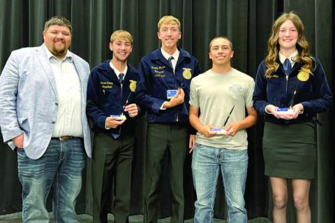 Britton Putman with Senior FFA members Cason Crump, Braedin Mason, Zane Jaggars, and Kinlee Allen.