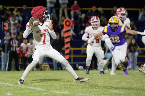 QB1 Will Lewis drops back to pass.